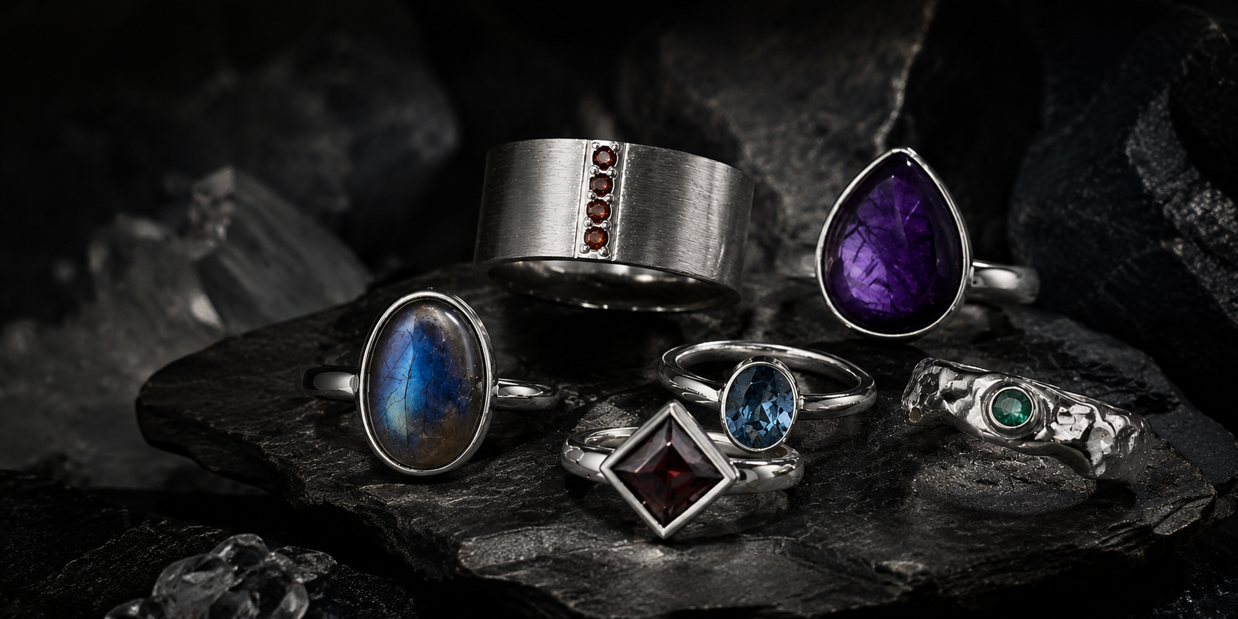 Handcrafted sterling silver rings featuring natural gemstones and contemporary designs. 
